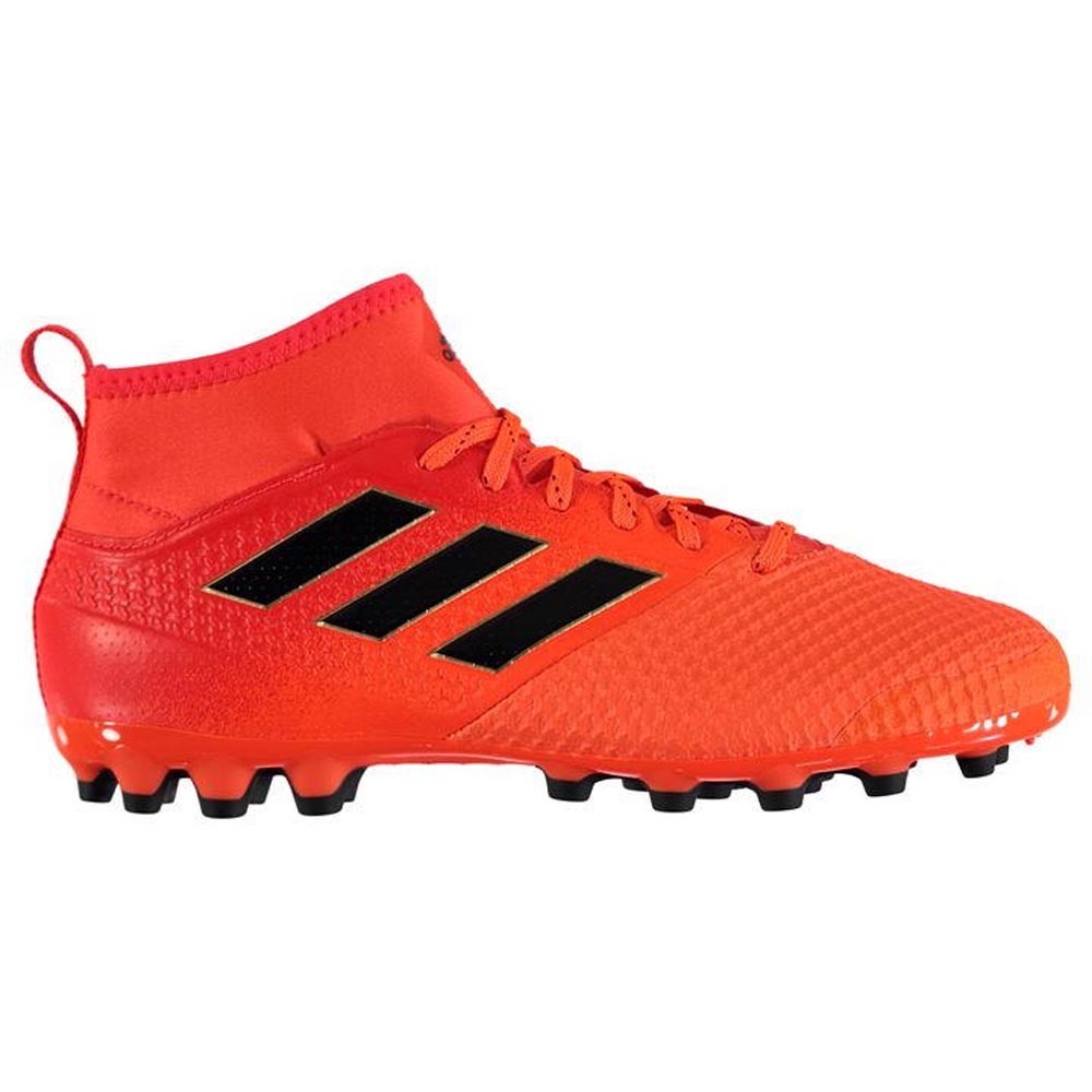 orange and black adidas boots